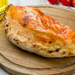 Pizza CALZONE  Jamón York y Champions 