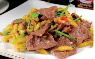 43 Filetto di manzo saltato con peperoncini in salamoia