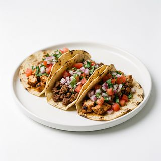 Tacos con pollo e manzo misto