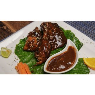 Jerk chicken quarter & fries