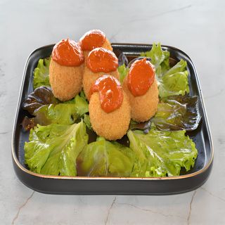 Perle de burduf cu sos de ardei copți