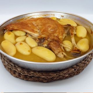 Cabrito asado con patatas
