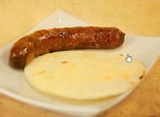 Chorizo Con Arepa (1 Ud.)