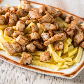 Raxo con patatas (ración)