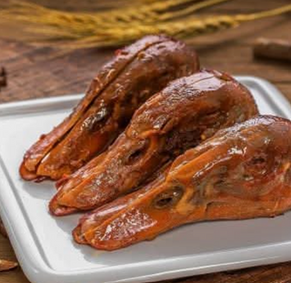 麻辣鸭头Cabeza de pato (3 piezas)