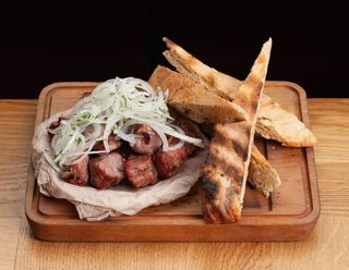 Шашлик зі свиного ошийку на лаваші (280/100г)