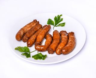 Carnaciori in mat de oaie la gratar