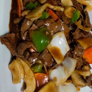 Vaca com feijão preto