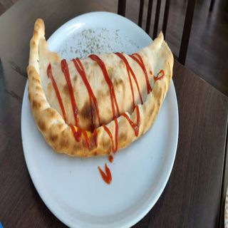 Pizza Calzone Queso De Cabra Y Verduras