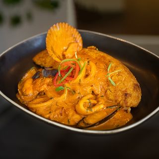 Tacu Tacu con Salsa de Mariscos