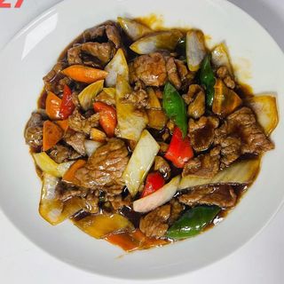 527 Ternera Con Salsa Ostras