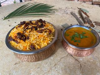 Veg Biryani + Gravy + Soda