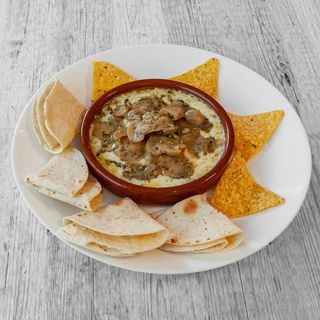 Queso fundido con Champiñon