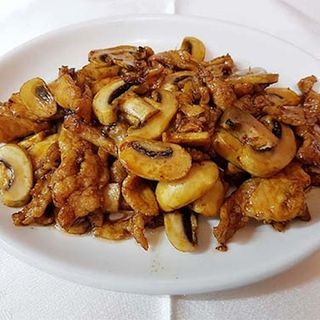 Cerdo con champiñones