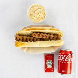 Хот-дог кебапче и сос + салата по избор  + Кока Кола Кен