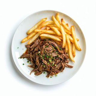 Ración De Patatas Con Carne