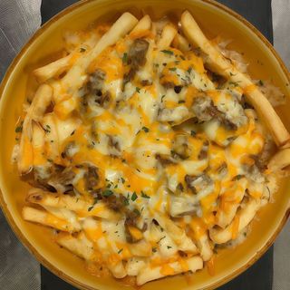 Patatas Boloñesa Con Queso Gratinado