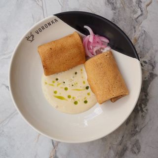 Pancakes with pulled beef and mushroom foam