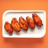 Крильця в кисло-солодкому соусі