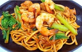 34. Spaghetti saltati con gamberetti