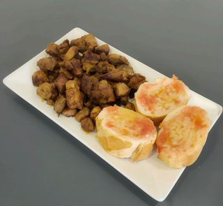 Tapa De Pinchitos Y Pan
