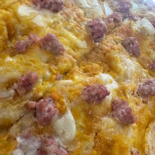 Crema di zucca e salsiccia o pancetta arrotolata