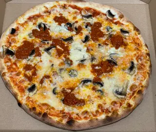 Pizza de la casa (30 cm.)
