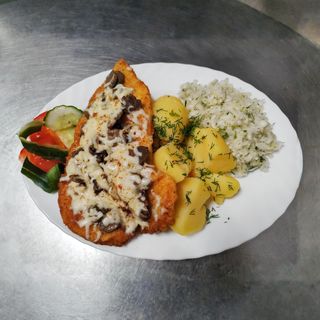 Schabowy z pieczarkami i serem