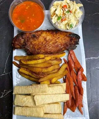 Fried Yam and Plantains with Egg Sauce and Sausage