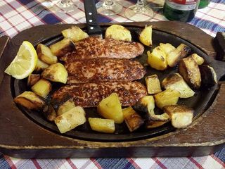 Salsiccia con patate al forno