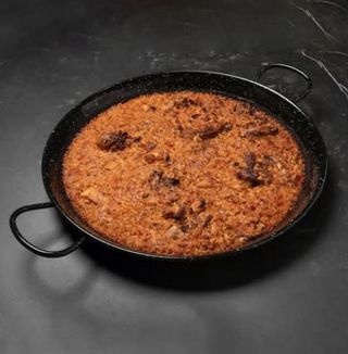 Paella de pollo (ración)