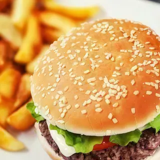 Combo Sin Miseria Hamburguesa (100 Grs.).  +Jamón , Queso y Papas fritas