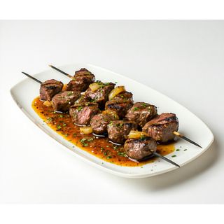 Pinchos De Cordero Al Ajillo (Ración)