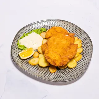 Pileći zagrebački odrezak s prilogom