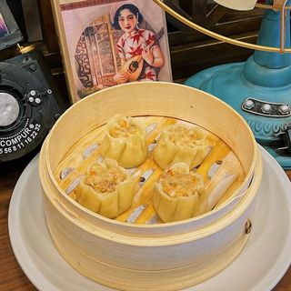 210 Ravioli con ripieno gamberi e carne al vapore 虾蒸饺