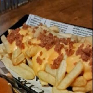 Patatas Con Queso Fundido Y Bacon