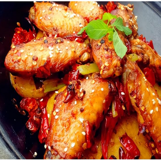 Ali di pollo alla scodella di fuoco (piccante)