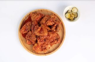 Курица в чесночном соусе (порция)