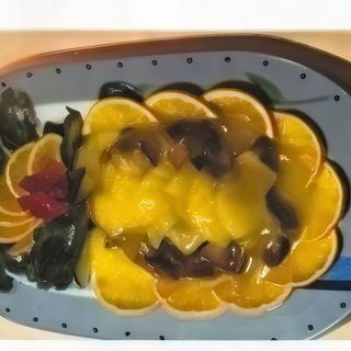 Pato con salsa de piña