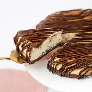 PORCIÓN BROWNIE CHEESECAKE
