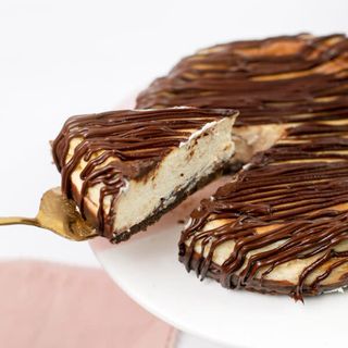 PORCIÓN BROWNIE CHEESECAKE