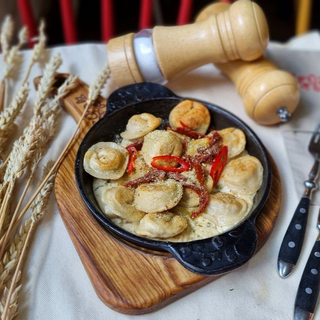 Смажені  зі свинини  з сирним соусом (230г)