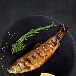 ФОРЕЛЬ річкова. Фарширована овочами та лимоном.