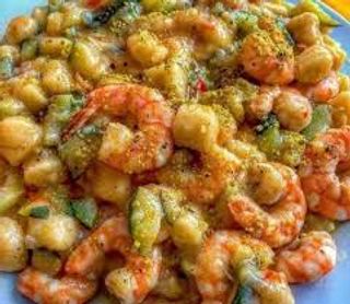 Gnocchi zucchine, gamberi e pachino
