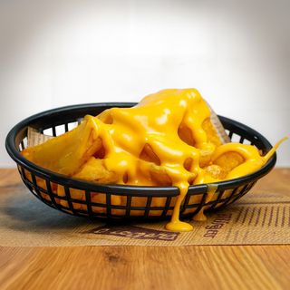 Patatine fritte con formaggi