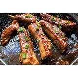 Fried pork ribs with onions