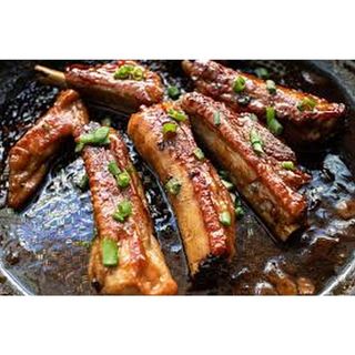 Fried pork ribs with onions