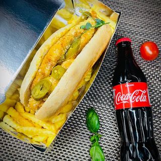 Baguette with chicken schnitzel and cheese sauce + fries + cola