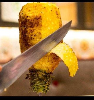 Piña asada con Helado de Coco