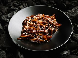 Свинячі вушка в соусі Унагі (100g)